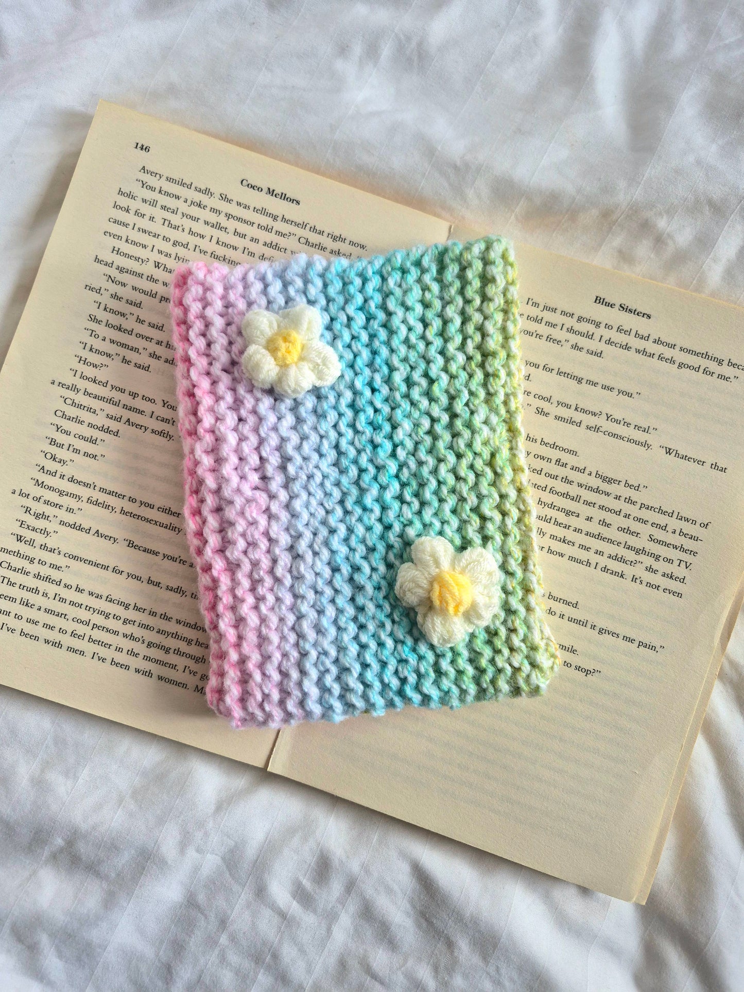 Small Rainbow knitted Kindle sleeve with white flowers