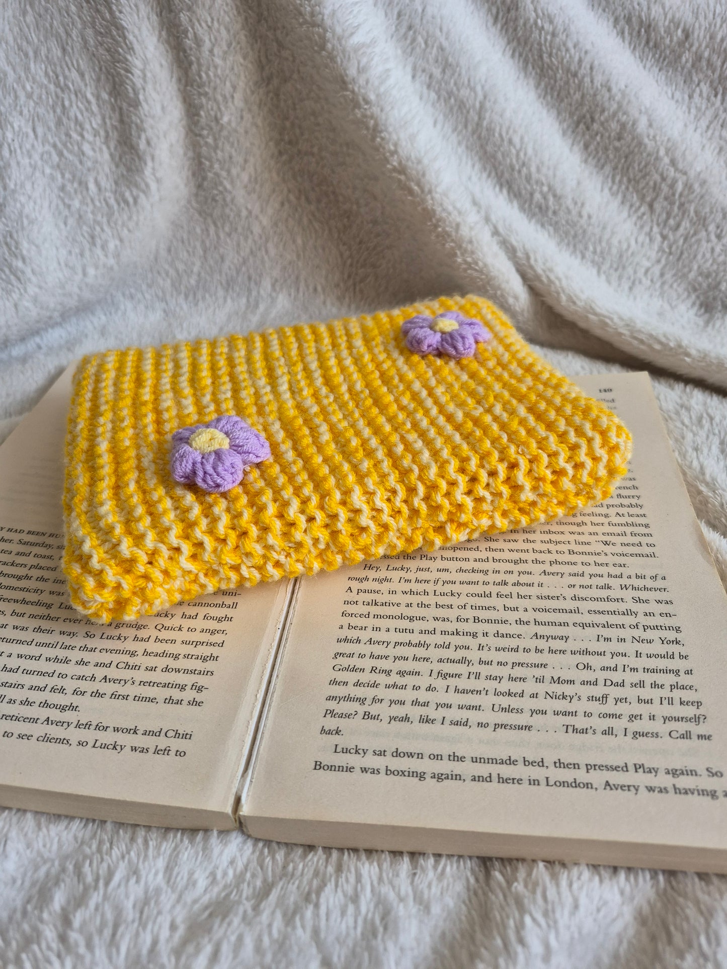 Large yellow knitted Kindle sleeve with purple flowers