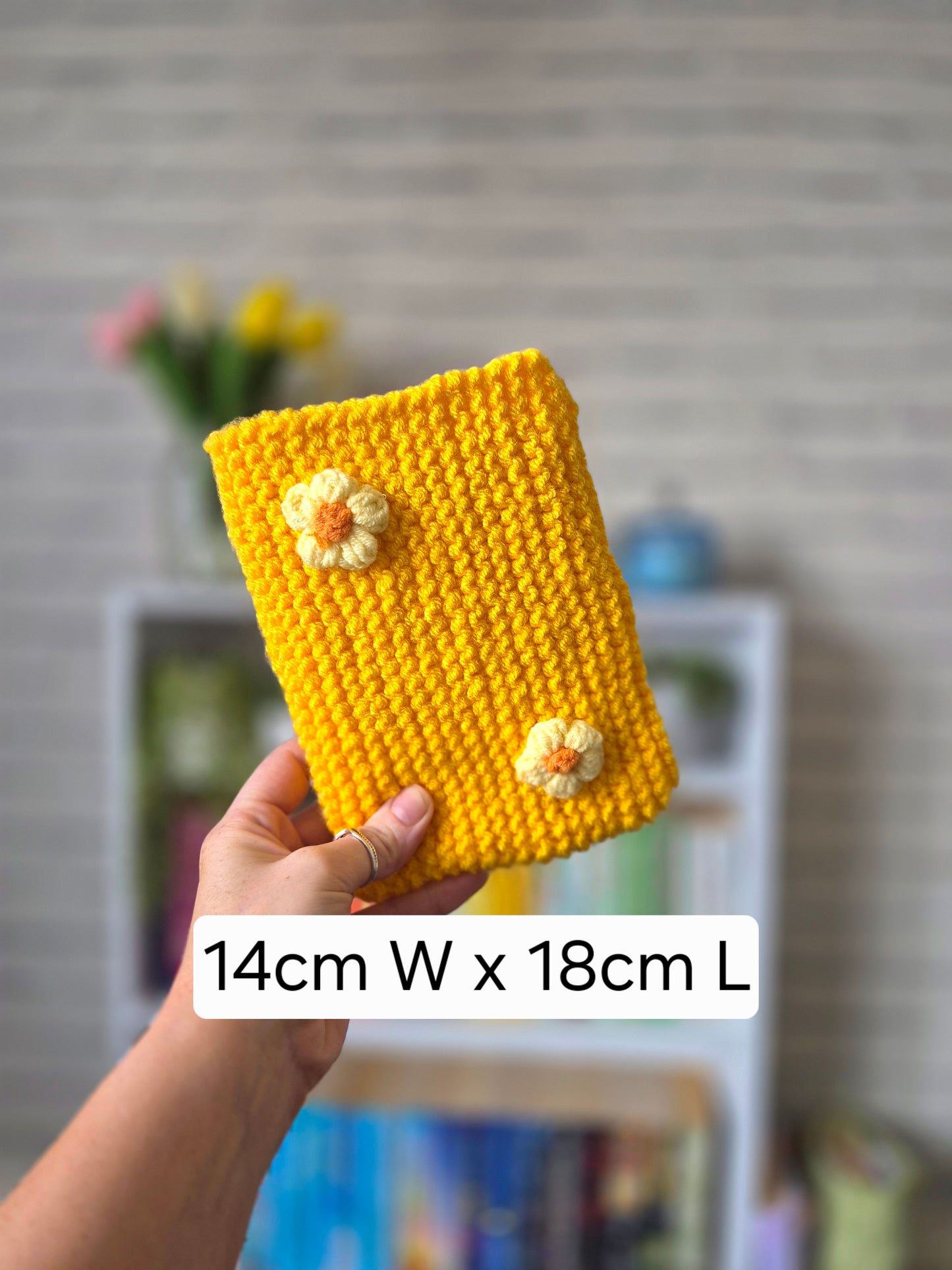 Dark yellow/orange knitted Kindle sleeve with yellow flowers (Large)