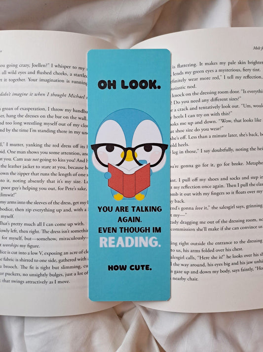 Funny penguin reading bookmark