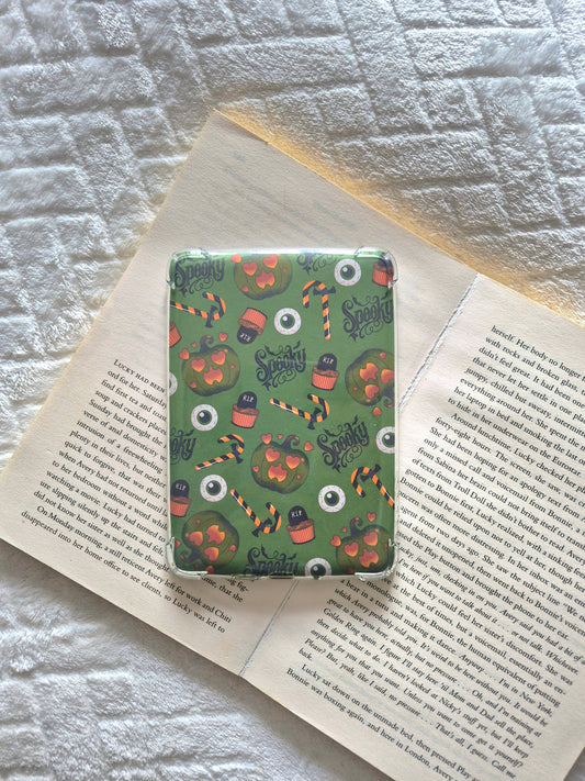 Spooky season pumpkins and candy canes gothic green kindle insert.