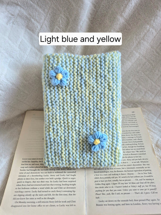 Blue & Yellow knitted book sleeve with blue flowers