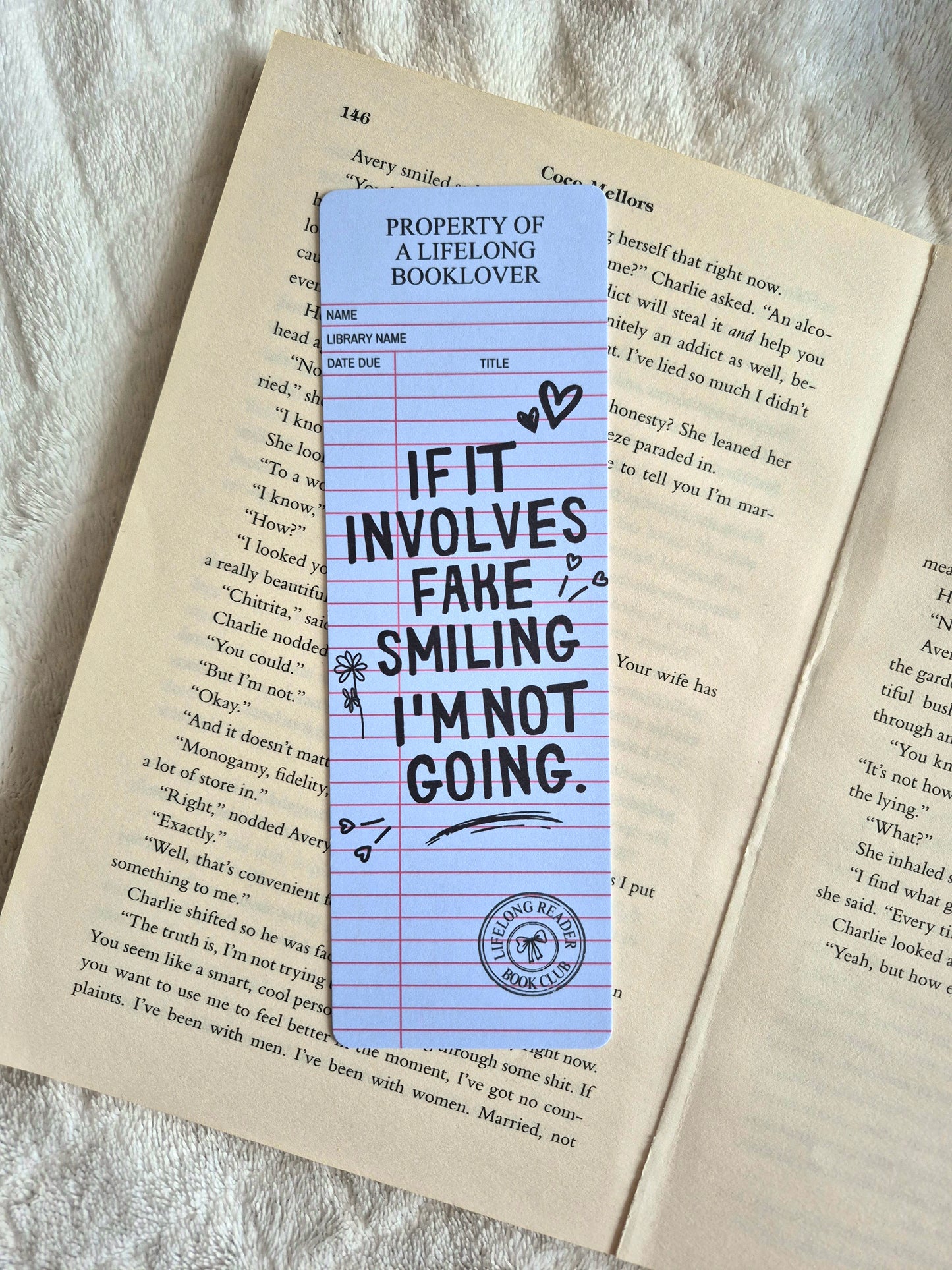 If it involves fake smiling I'm not going library card bookmark