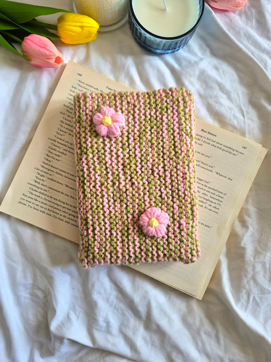 Green and pink knitted book sleeve