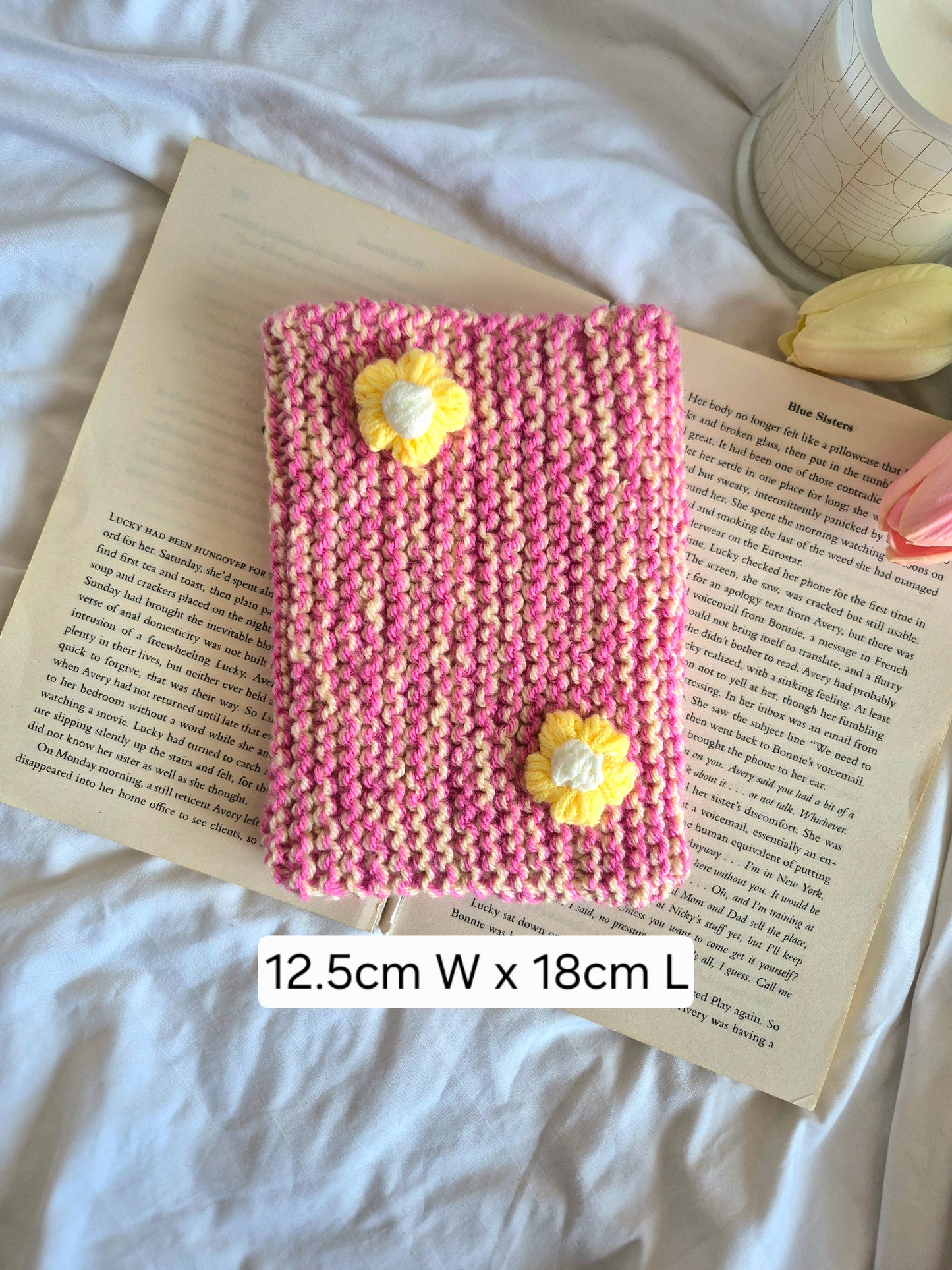 Small pink & yellow knitted Kindle sleeve with yellow flowers