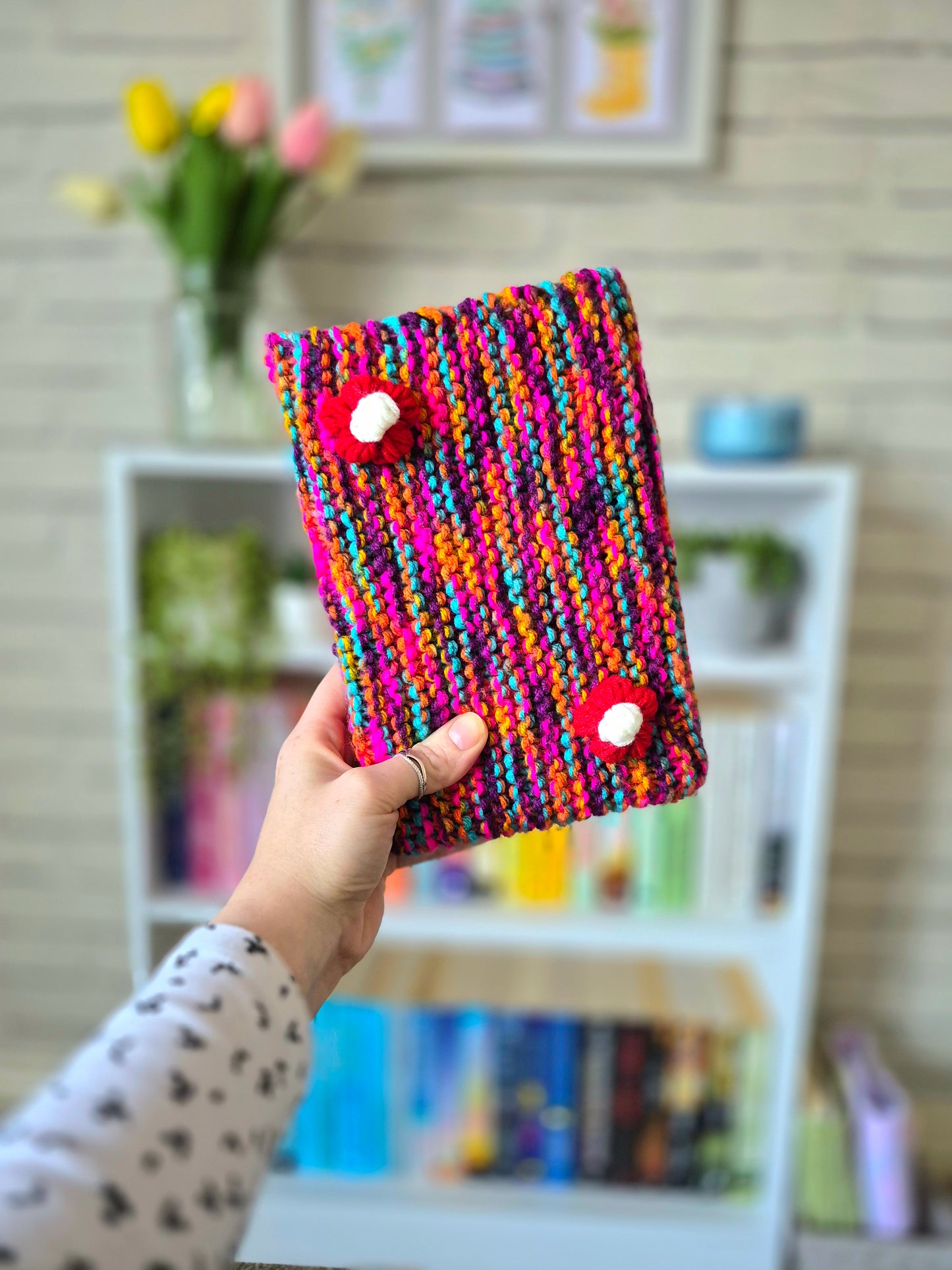 Multicoloured summer knitted book sleeve
