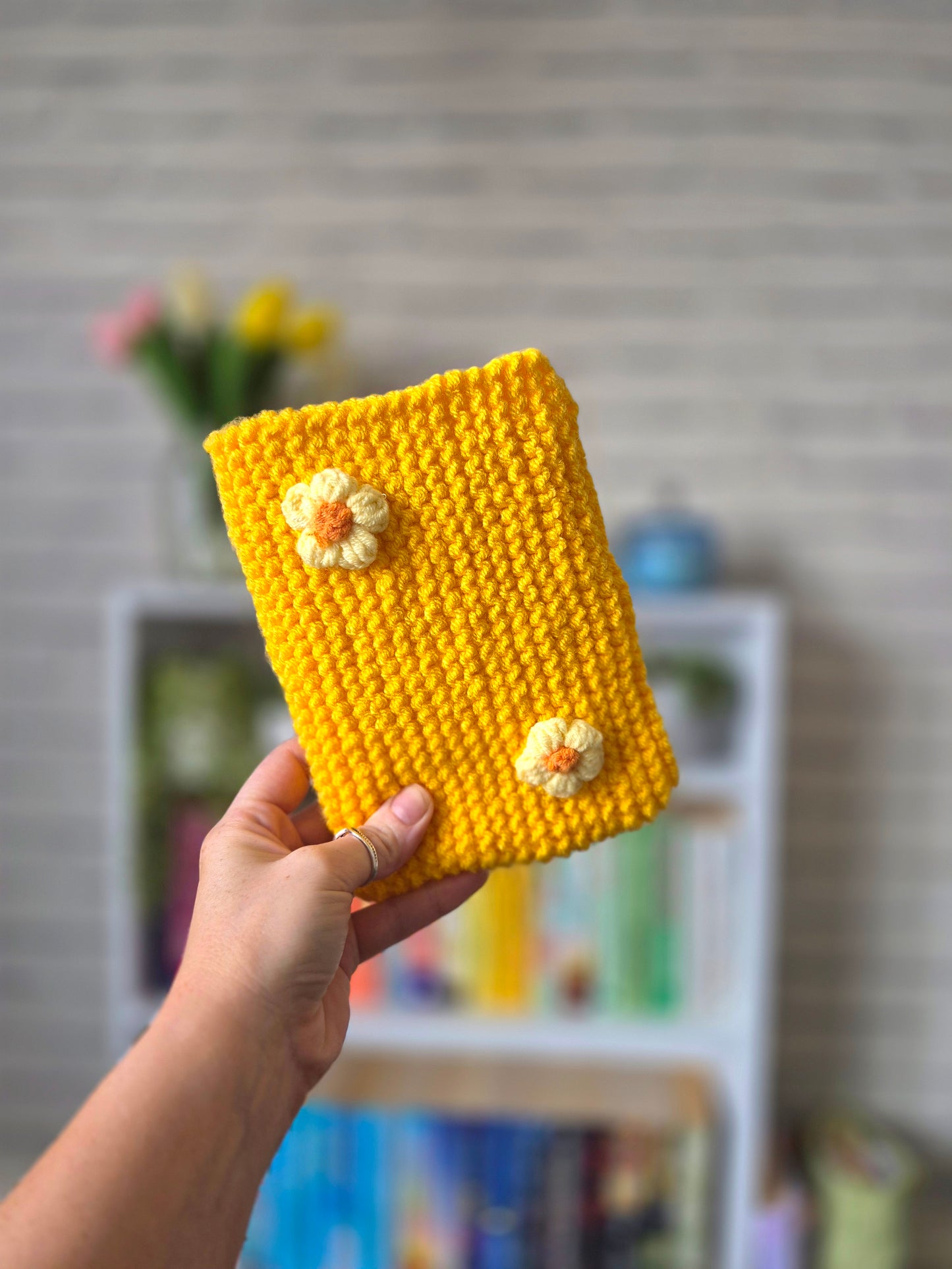 Dark yellow/orange knitted Kindle sleeve with yellow flowers (Large)
