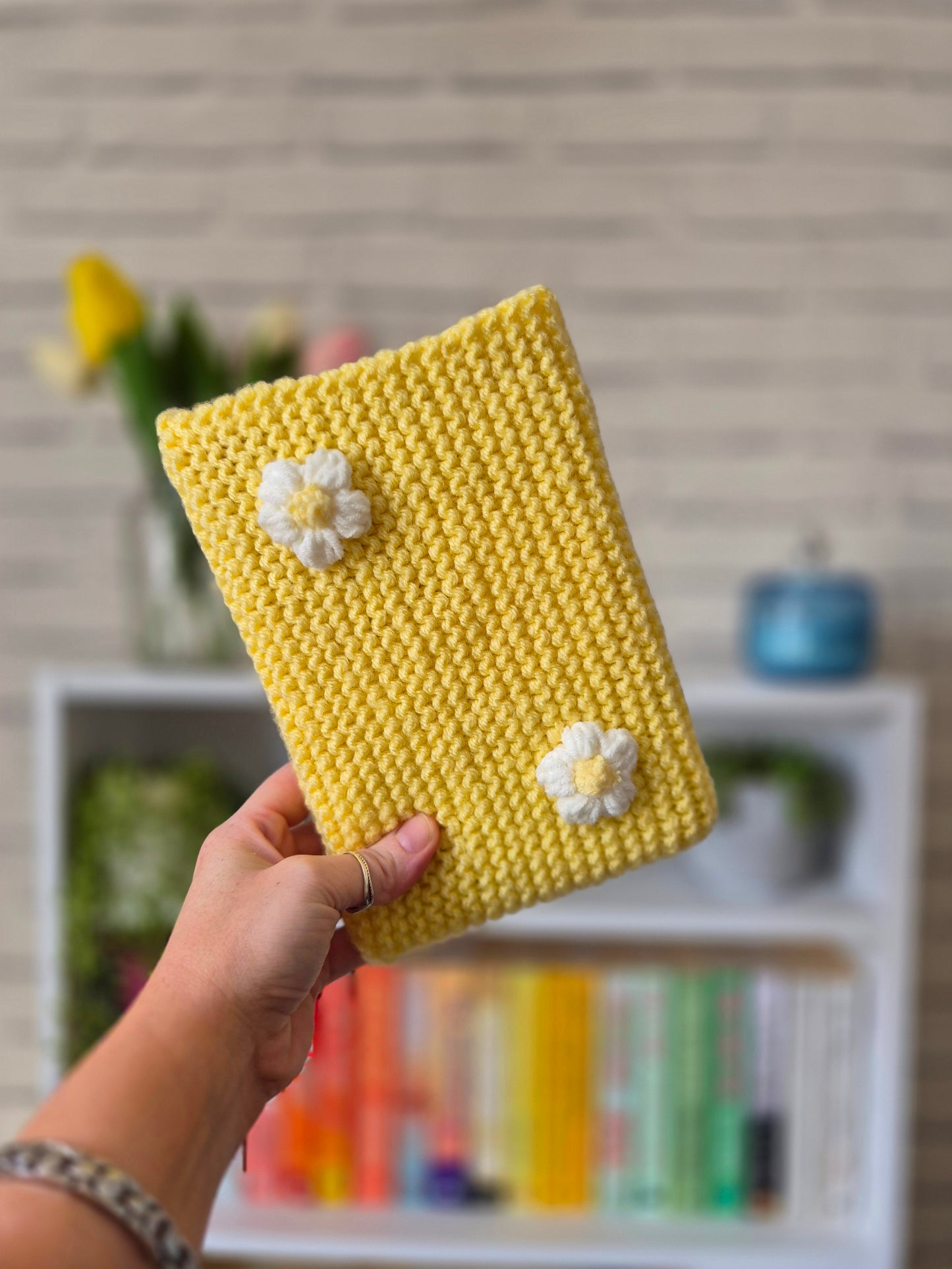 Butter Yellow Knitted book sleeve with white flowers