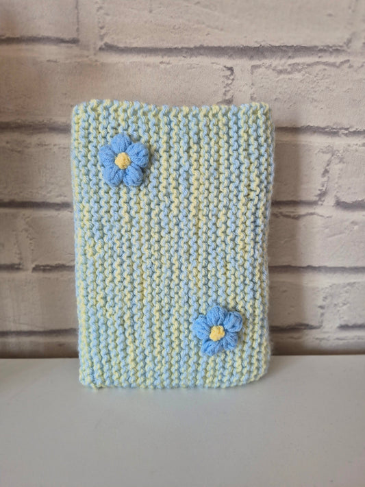 Blue & Yellow knitted book sleeve with blue flowers