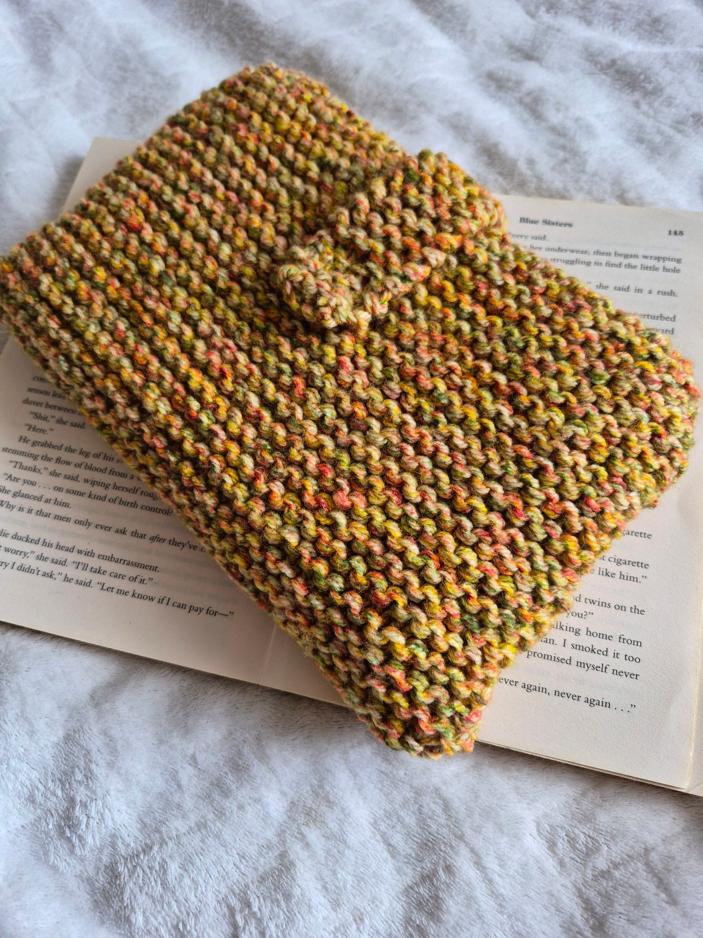 Mixed autumnal colours knitted book sleeve