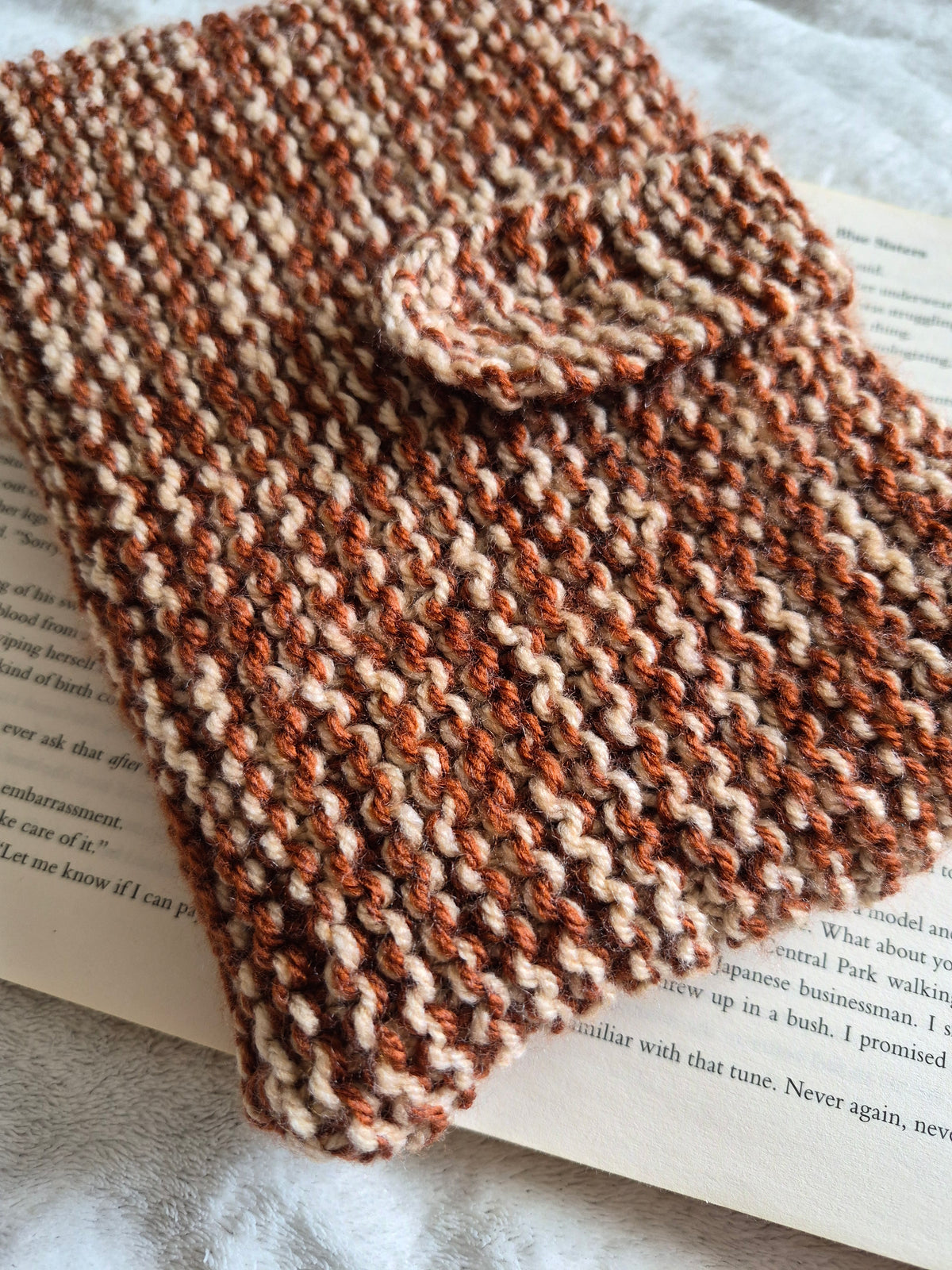 Brown and cream autumnal knitted book sleeve